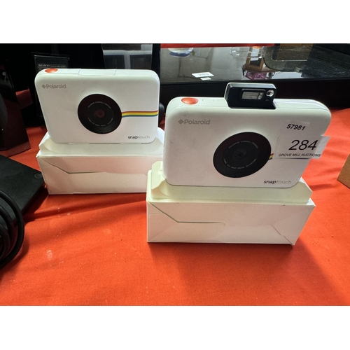 284 - 2 POLAROID SNAP TOUCH CAMERAS (A/F)