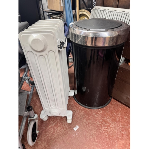 11 - FLIP TOP WASTE BIN & AN OIL FILLED HEATER(A/F)