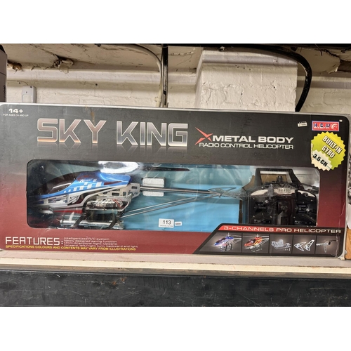 113 - BOXED SKY KING REMOTE CONTROLLED HELICOPTER(RESERVED AT £30)