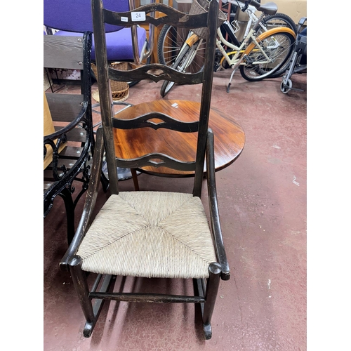 24 - RUSH SEATED LADDER BACK ROCKING CHAIR