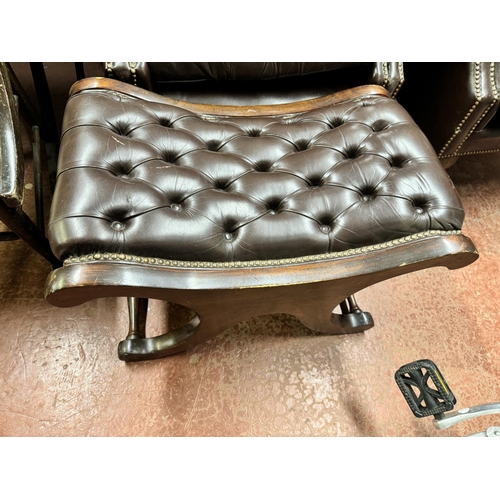 29A - 2 DEEP BUTTONED BROWN LEATHER CHESTERFIELD ARMCHAIR & MATCHING FOOTSTOOL