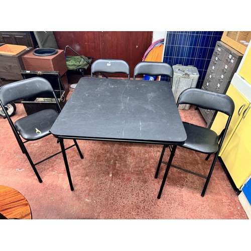 34 - FOLDING PLASTIC DINING TABLE & 4 CHAIRS