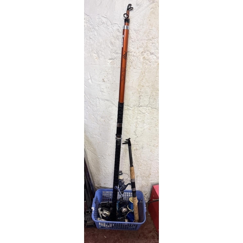 54 - 2 FISHING RODS & BASKET OF REELS & LINE