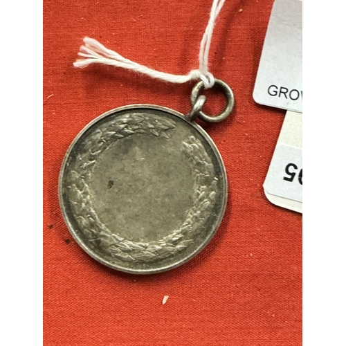 215 - 1950'S SILVER FOOTBALL MEDAL