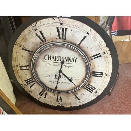 31 - LARGE CIRCULAR 'CHARDONNAY HOTEL' WALL CLOCK