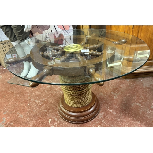 13 - 'SHIP'S WHEEL' GLASS TOPPED TABLE(RESERVED AT £30)