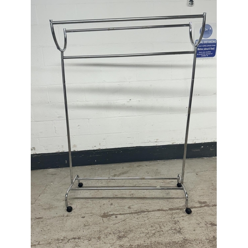 22 - CHROME CLOTHES RAIL WITH WHEELS