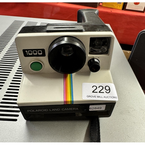 229 - POLAROID 1000 CAMERA