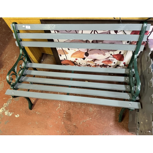 27 - CAST IRON ENDS WOODEN SEAT & BACK GARDEN BENCH