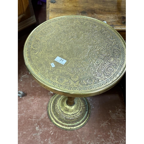 31 - BRASS EMBOSSED PEDESTAL CIRCULAR TABLE