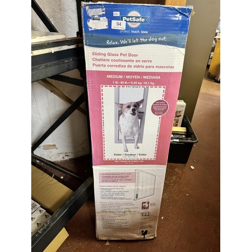 94 - BOXED PETSAFE SLIDING GLASS PET DOOR