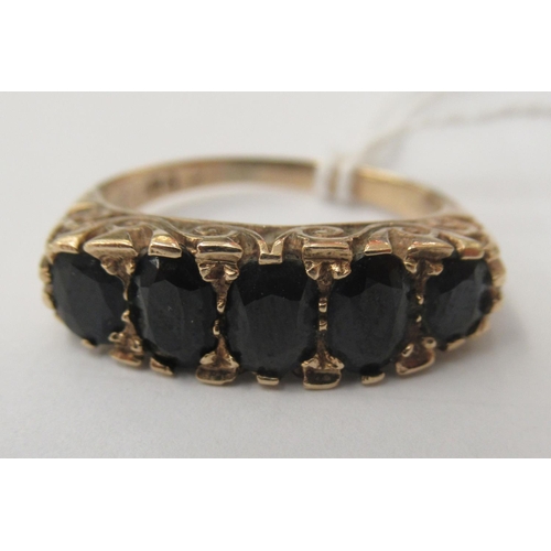 128 - A 9ct gold ring, set with five oval cut graduated sapphires&nbsp;&nbsp;