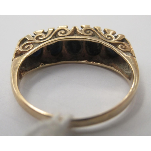 128 - A 9ct gold ring, set with five oval cut graduated sapphires&nbsp;&nbsp;