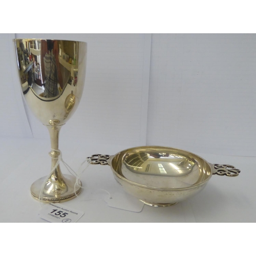 155 - A silver pedestal goblet  Sheffield 1907; and a silver quaiche London 1946  4