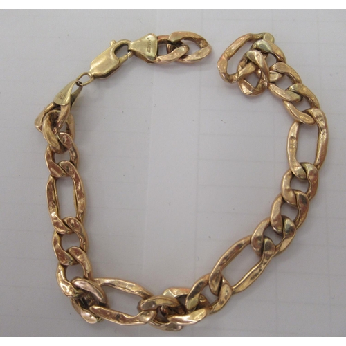 159 - A yellow metal curb link bracelet&nbsp; stamped 10k; and a Gruen gold plated manual wristwatch, face... 