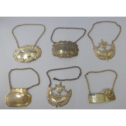 174 - Six silver decanter labels  mixed marks; and a set of six silver teaspoons  Sheffield 1948  cased