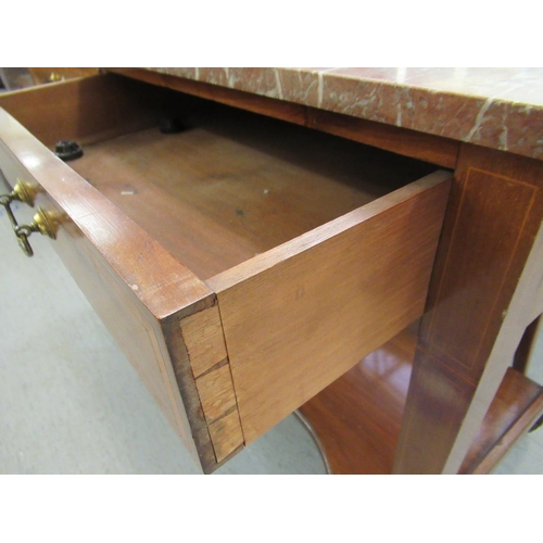 101 - An Edwardian ebony crossbanded and string inlaid washstand, the (broken) marble top over two inline ... 