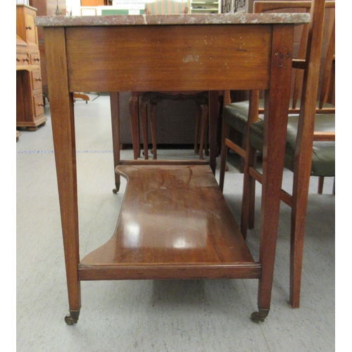 101 - An Edwardian ebony crossbanded and string inlaid washstand, the (broken) marble top over two inline ... 