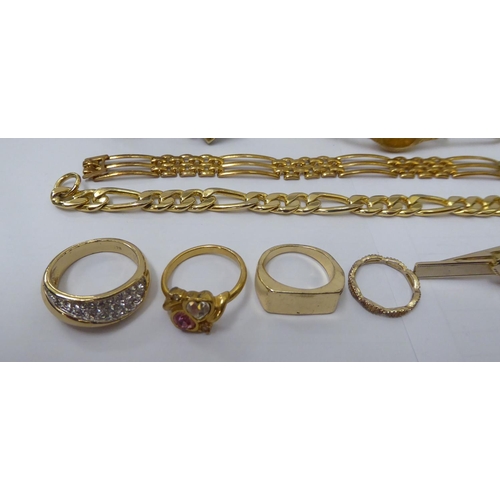 103 - Yellow and white metal costume jewellery: to include a 9ct gold filled hinged bangle