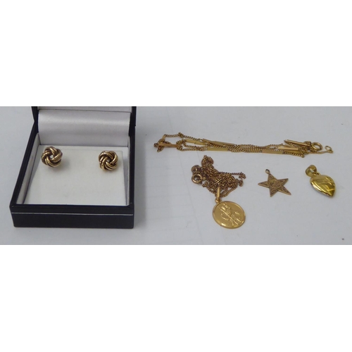 129 - Gold, gold coloured and yellow metal items of personal ornament: to include a fine 9ct gold neckchai... 