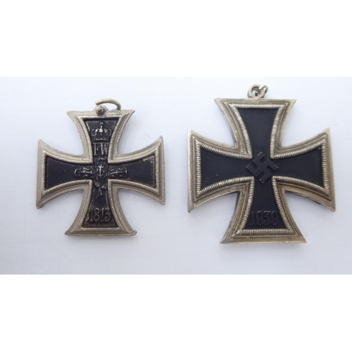 131 - Nazi collectables, viz. a white metal belt buckle, stamped with swastika emblems and Rd.719493; an 1... 