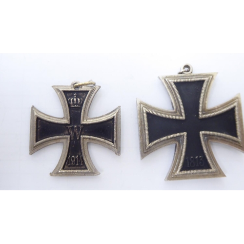 131 - Nazi collectables, viz. a white metal belt buckle, stamped with swastika emblems and Rd.719493; an 1... 