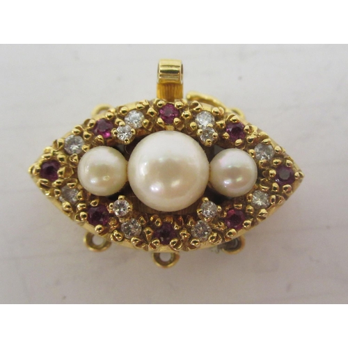 329 - An 18ct gold clasp, set with pearls, rubies and diamonds 