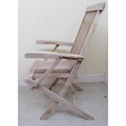 336 - A modern Lindsey teak garden table with a slatted octagonal top, raised on folding legs  30