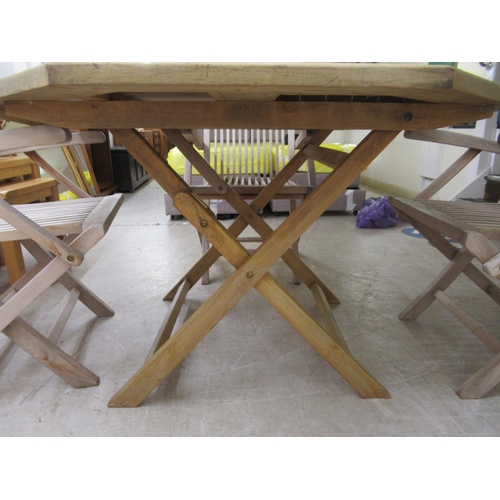 336 - A modern Lindsey teak garden table with a slatted octagonal top, raised on folding legs  30