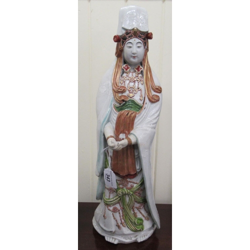 343 - A 19thC Chinese porcelain standing female figure, wearing ceremonial robes  20