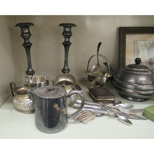 78 - A mixed lot: to include silver plated tableware and a pair of base metal candlesticks with detachabl... 