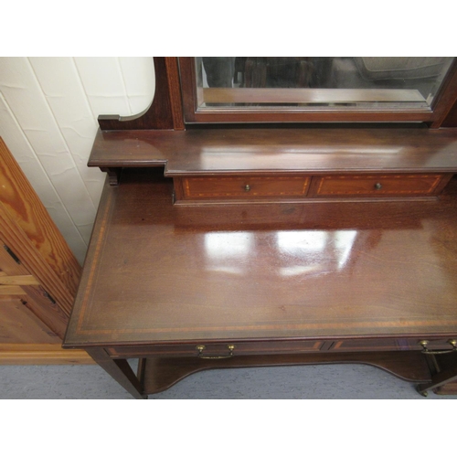 87 - An Edwardian Maple & Co ebony inlaid crossbanded and string inlaid mahogany dressing table, surm... 