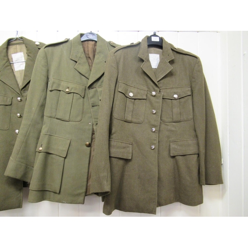 30 - Nine Army dress tunics, some bearing labels, some with matching trousers  various sizes