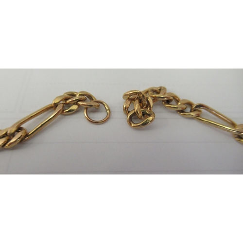 131 - A 9ct gold chiselled and extended curb link, double watch chain