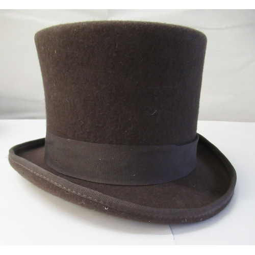 17 - A Major Ware chocolate brown top hat  size 6; a Major grey top hat  size S; another, in brown  size ... 