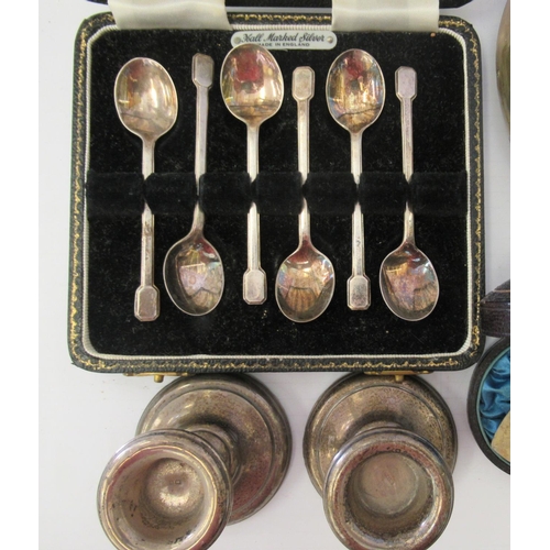 171 - Silver collectables and flatware: to include dwarf candlesticks  4.5