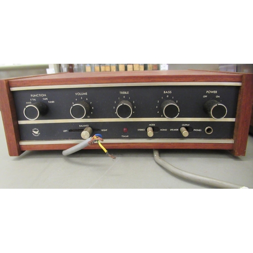 184 - A Garrard record deck, in a teak case; and an Eagle amp, in a teak case