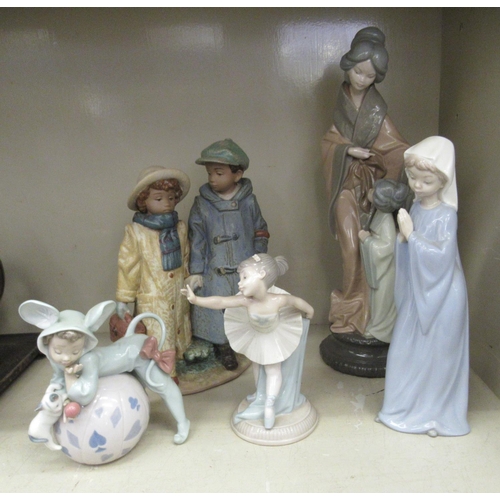 186 - Lladro and Nao porcelain figures: to include a child, dressed in a mouse costume  6