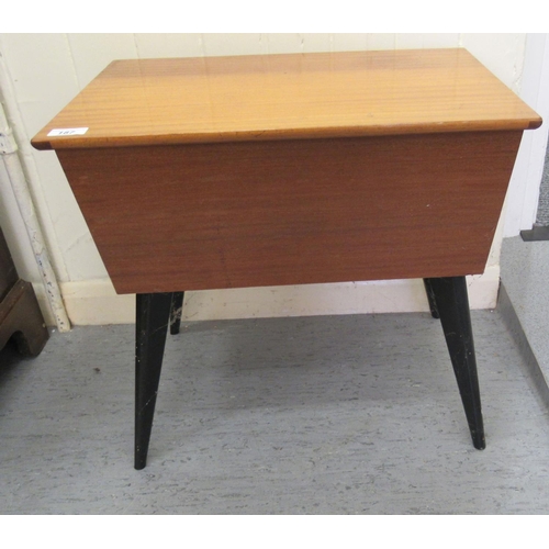 187 - A 1950/60s teak sewing box, on splayed, ebonised legs  20