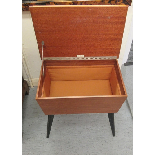 187 - A 1950/60s teak sewing box, on splayed, ebonised legs  20