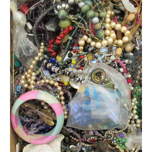 64 - Costume jewellery: to include bangles, loose and string beads, faux pearls and earrings 