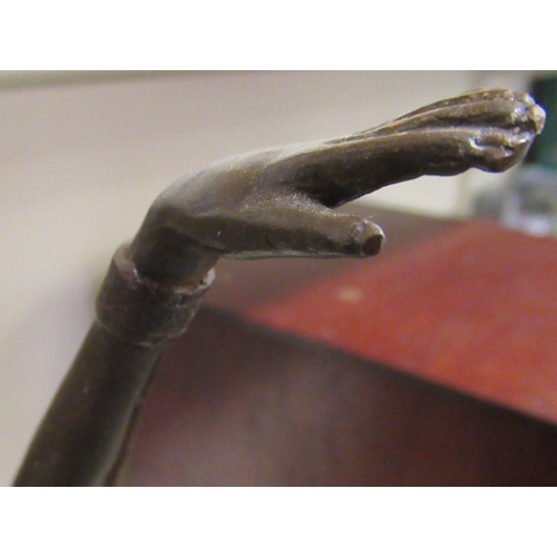 94 - An Art Deco style patinated bronze figure, a female dancer, on a marble and slate effect plinth ... 