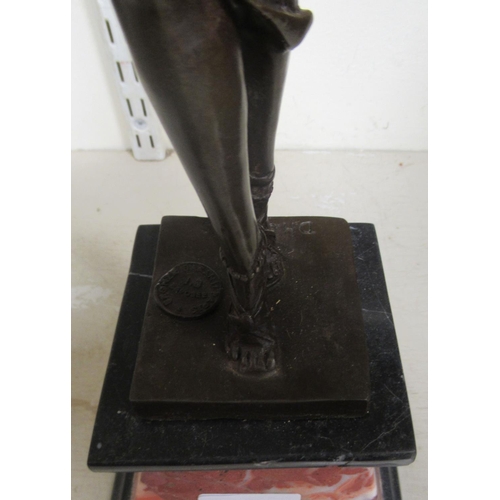 94 - An Art Deco style patinated bronze figure, a female dancer, on a marble and slate effect plinth ... 