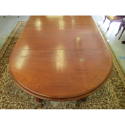 181 - A late Victorian mahogany wind-out dining table, raised on octagonal, fluted legs and casters  29