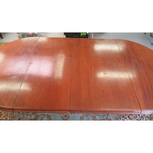 181 - A late Victorian mahogany wind-out dining table, raised on octagonal, fluted legs and casters  29