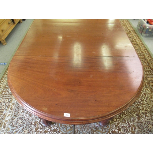 181 - A late Victorian mahogany wind-out dining table, raised on octagonal, fluted legs and casters  29