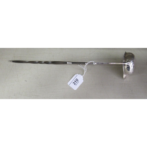 310 - A late 18th/early 19thC silver coloured metal toddy ladle, on a whalebone twist handle