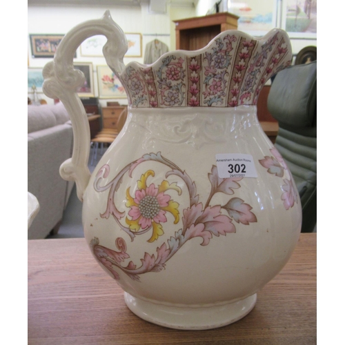302 - A late Victorian china wash jug and bowl, decorated with flora&nbsp; 16