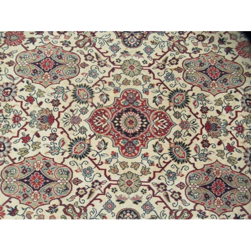 306 - A Caucasian rug, decorated with floral and foliate designs, on a cream coloured ground&nbsp; 78