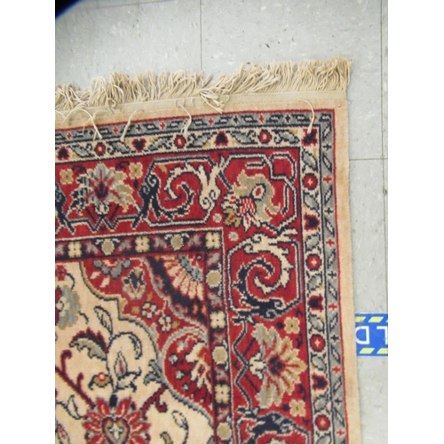 306 - A Caucasian rug, decorated with floral and foliate designs, on a cream coloured ground&nbsp; 78